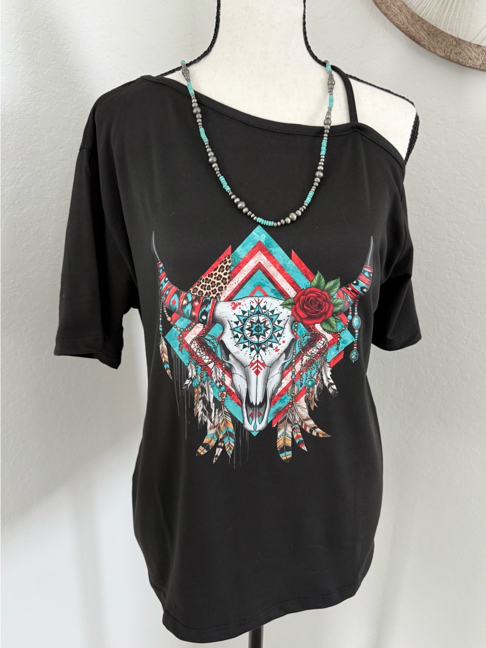 Women's Black Short-Sleeve Graphic Tee with Turquoise Accents